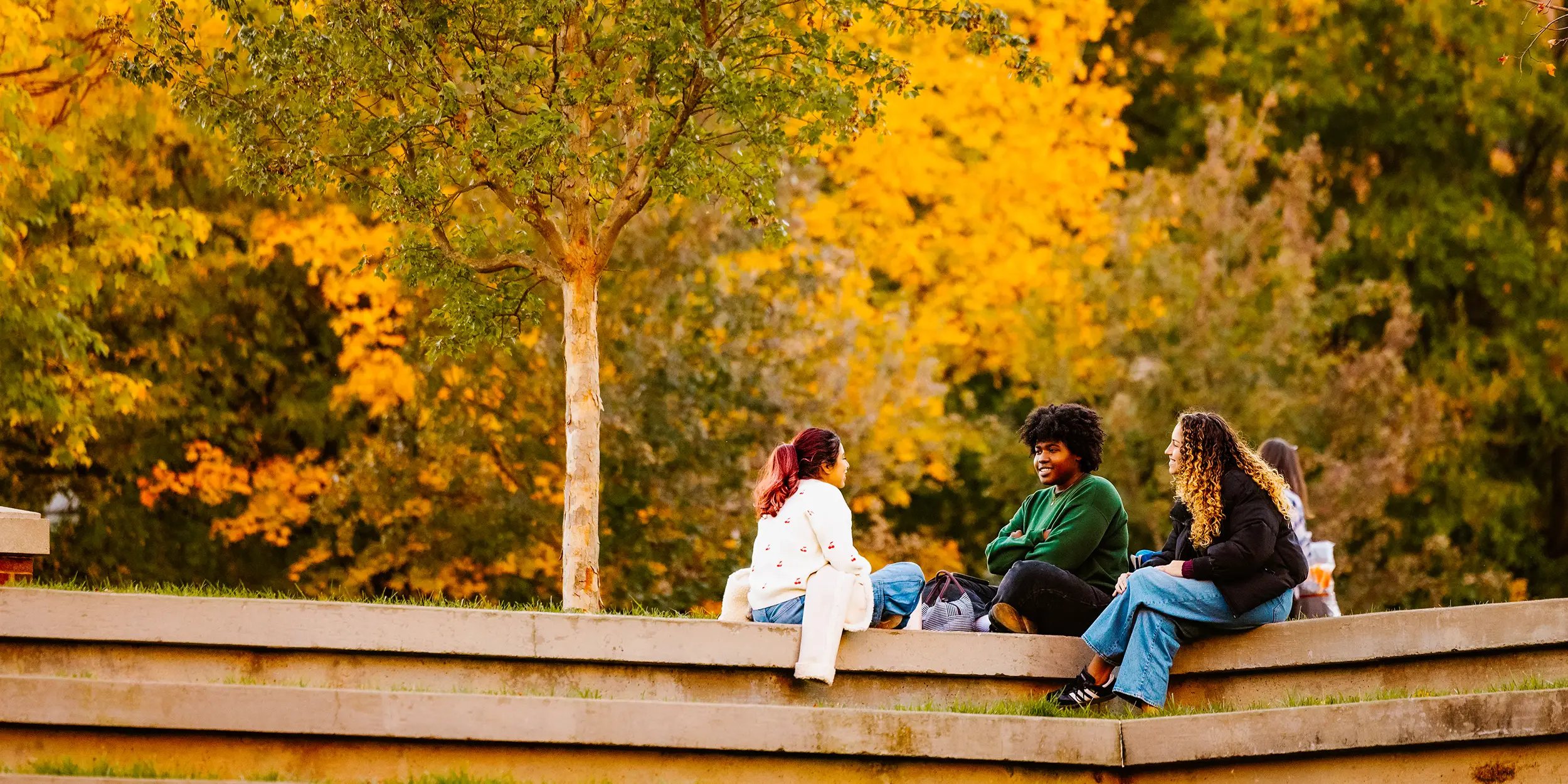Student hangout while relaxing at the HSS Amphitheatre on November 06, 2025. Photo by Steven Bridges/University of Tennessee.