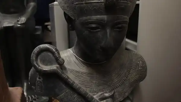 A photo of a bronze sculpture in the Africana Studies holdings.